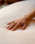 Close-up hand pressing soft plush fill