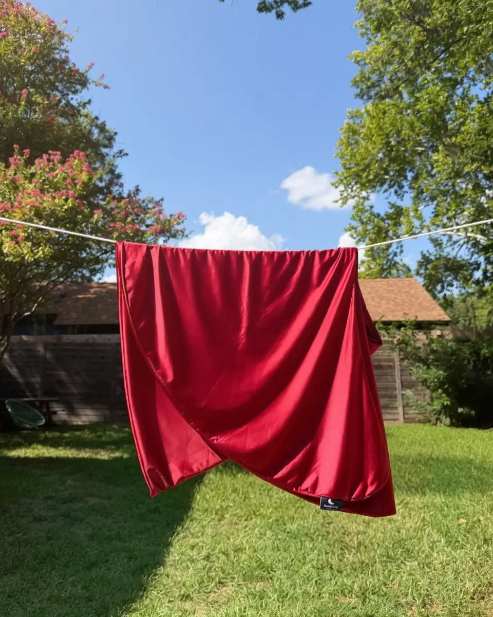 SnuggleMoon body pillow in Satin Crimson cover – view 1